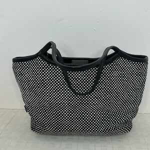 The Sak black and white houndstooth woven nylon bag